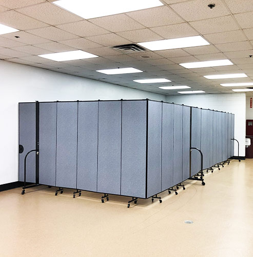 Hide Equipment with Privacy Walls - Screenflex Portable Room Dividers