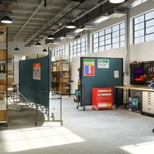 industrial warehouse dividers separating workspaces