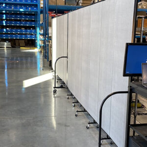 gray room divider in a warehouse setting